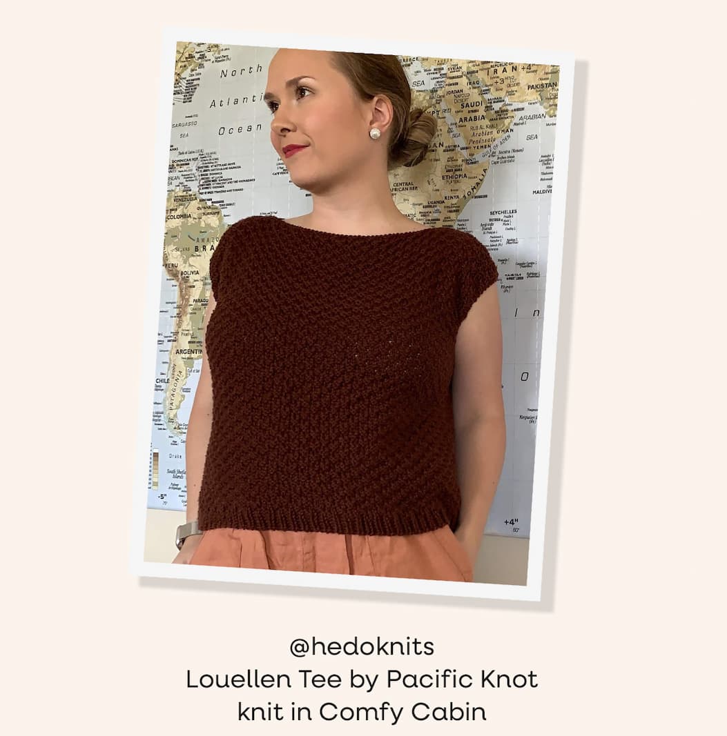 Image: A model is wearing a knit top in dark red yarn. Text: @PacificKnitCo Louellen Tee knit in Comfy Cabin. >>