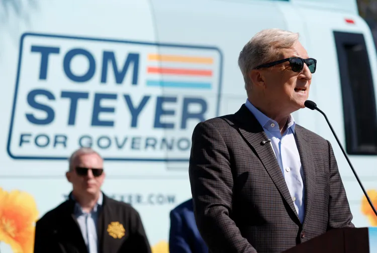 Tom Steyer speaks during a news conference in front of a Tom Steyer for Governor sign.