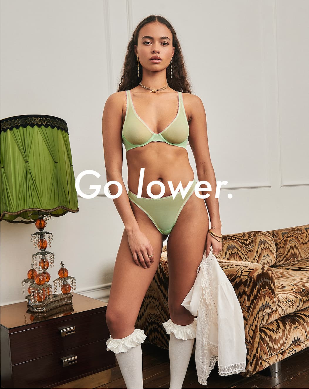 an image of a woman in a pink bra top with a message