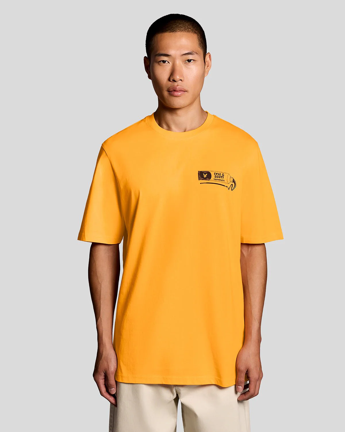 Model wearing Orange Blaze graphic print t-shirt