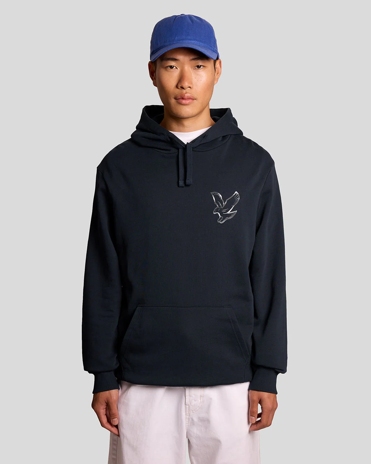 Model wearing a graphic print hoodie