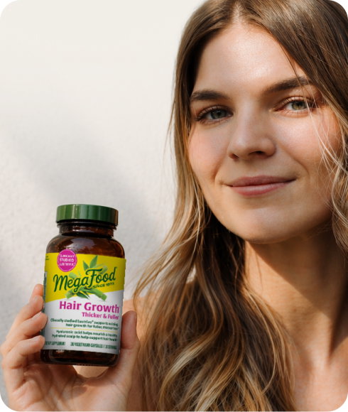 Woman with MegaFood Hair Growth Capsules