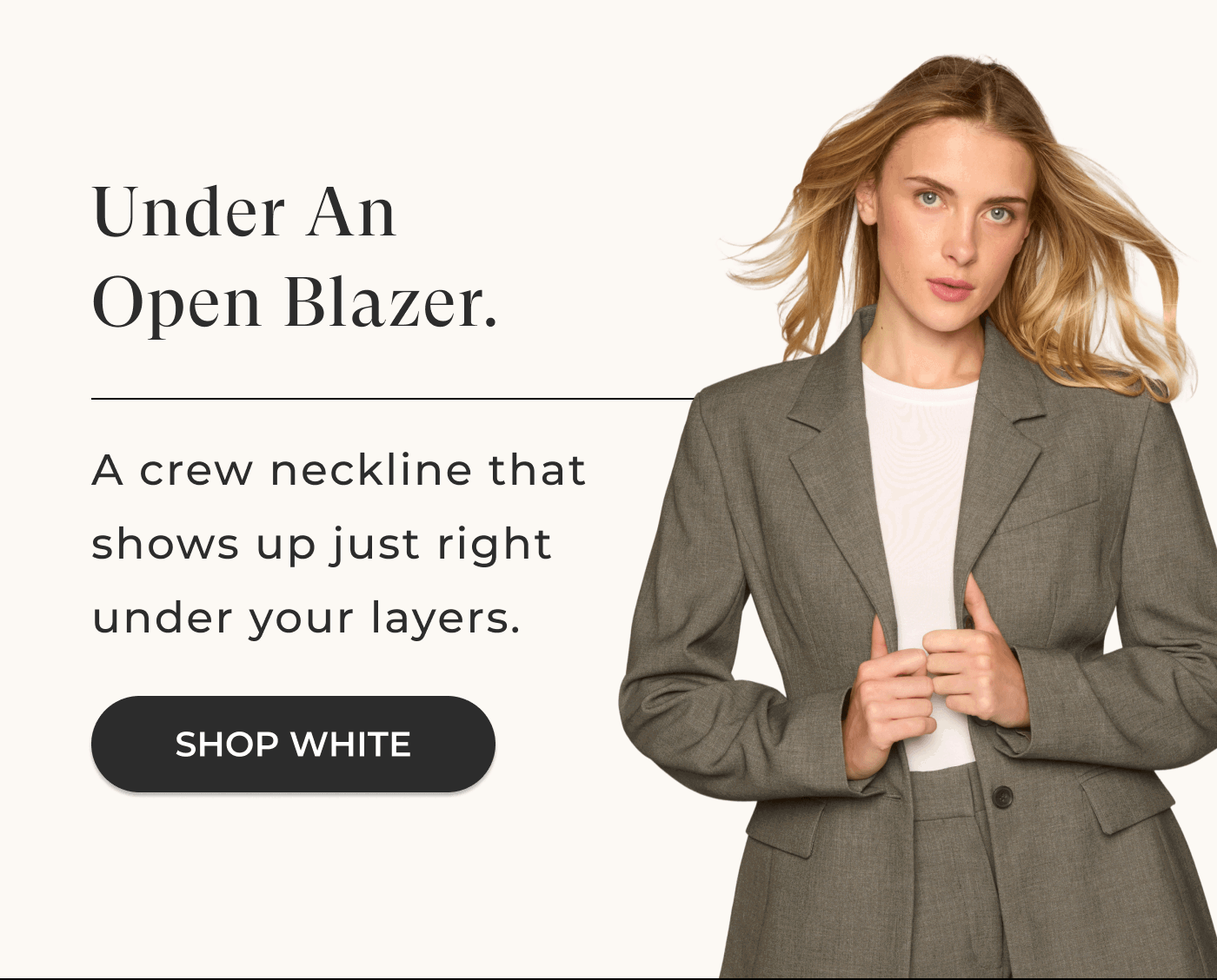 Under an open blazer 
