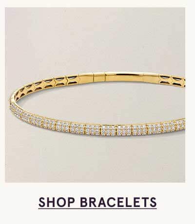 Gold pavé diamond bracelet, bangle-style. Click here to shop bracelets