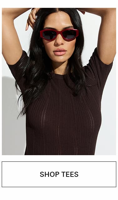 Woman wearing brown top
