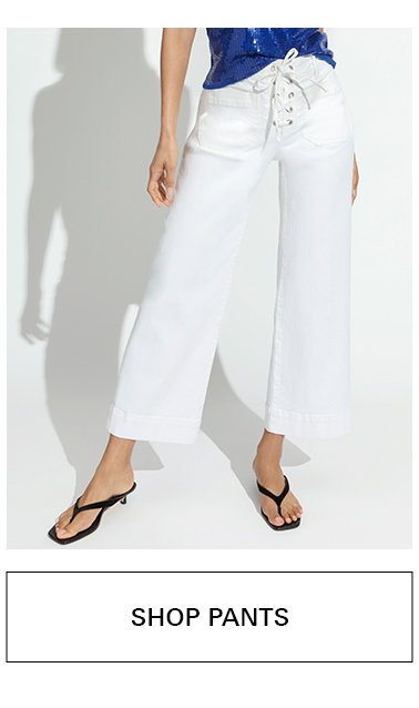 Woman wearing lace up marine. shop pants