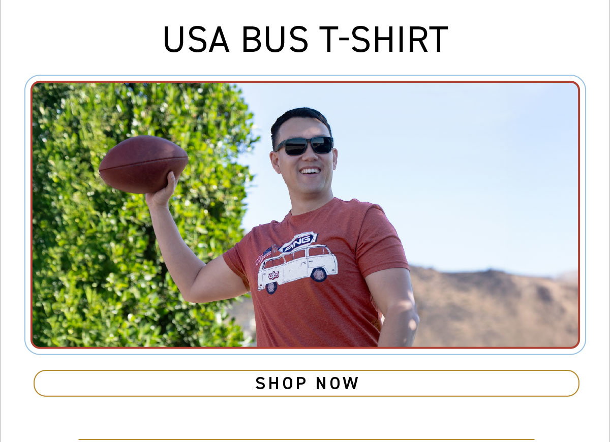 Man wearing USA Bus t-shirt throwing a football. click to shop now.