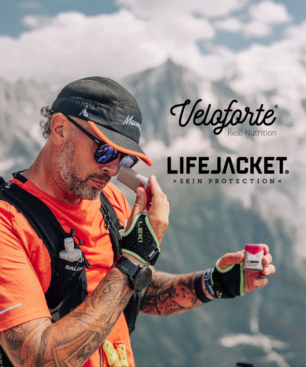 Image of a man up a mountain applying LifeJacket Skin Protection