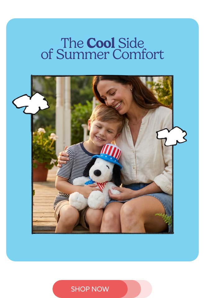 A woman and little boy hugging Americana Snoopy on a summer porch. Shop Now.