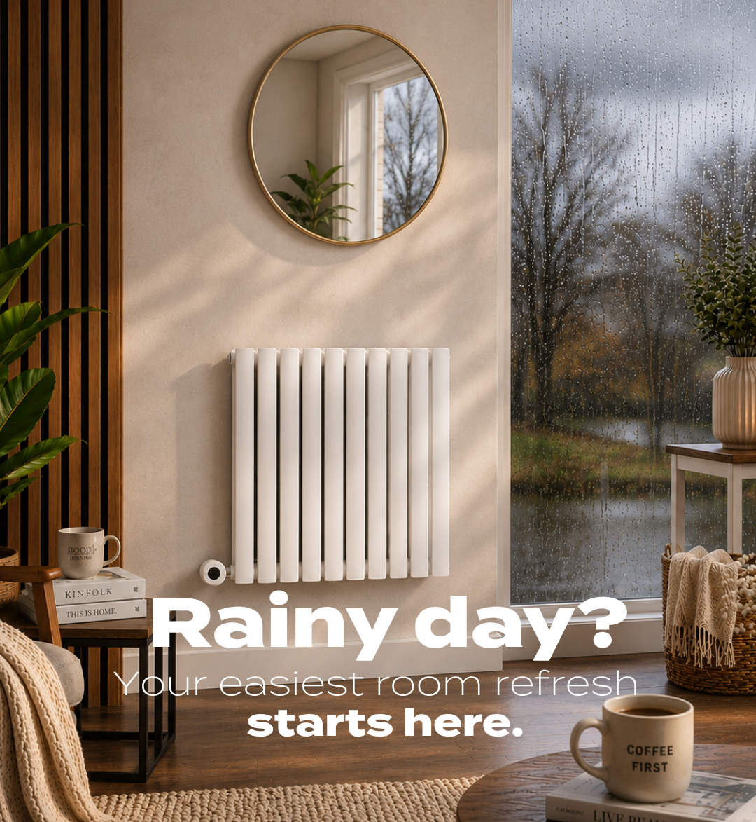 Cosy neutral-toned living room with a white vertical radiator mounted beneath a round mirror beside a large rain-covered window. Text overlay reads: “Rainy day? Your easiest room refresh starts here.”