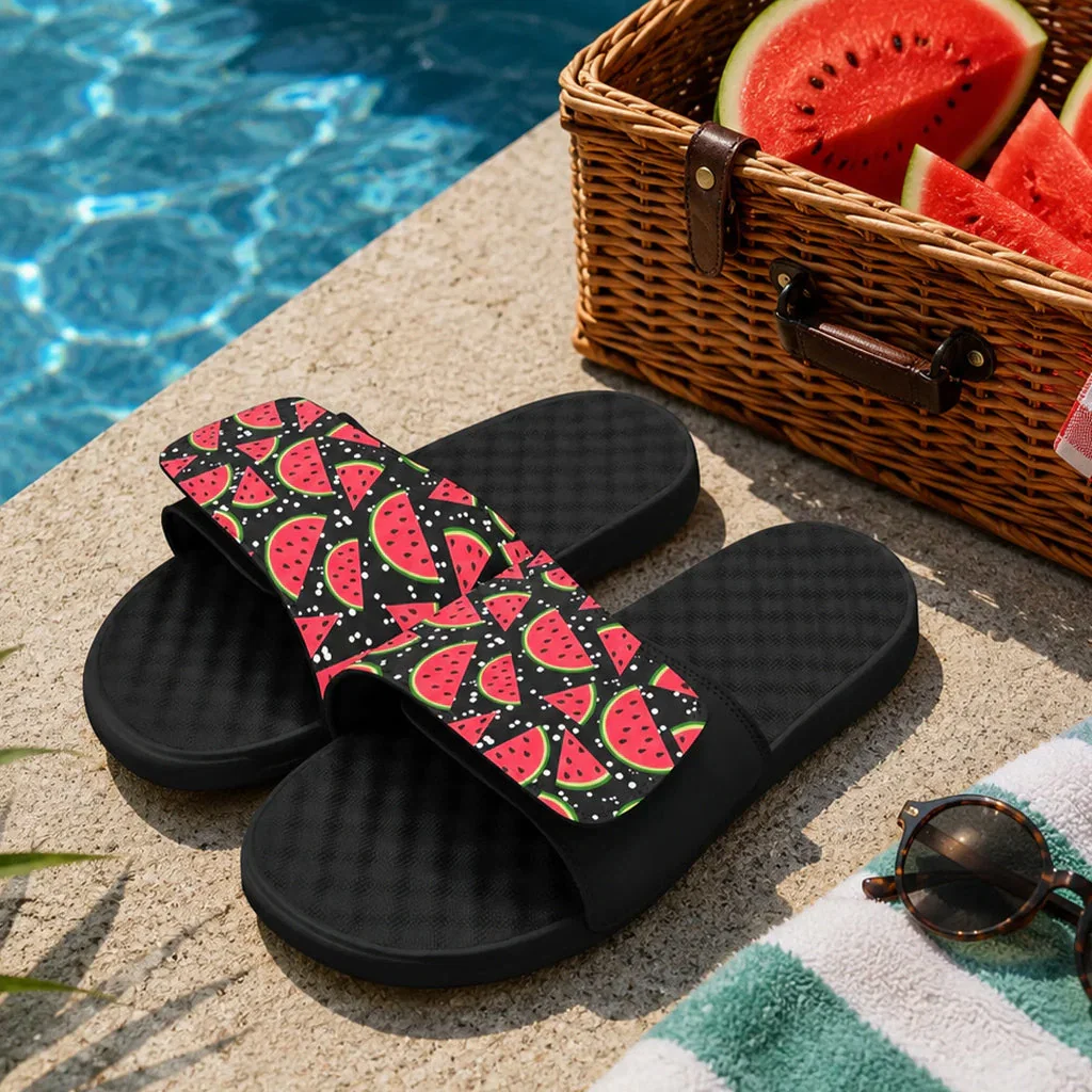 ISlide watermelon print slides by the pool with basket of fresh watermelons and sunglasses on towel