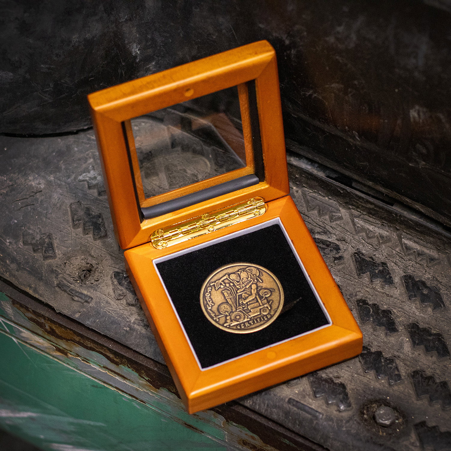 Wooden box displaying Forklift Certified Coin