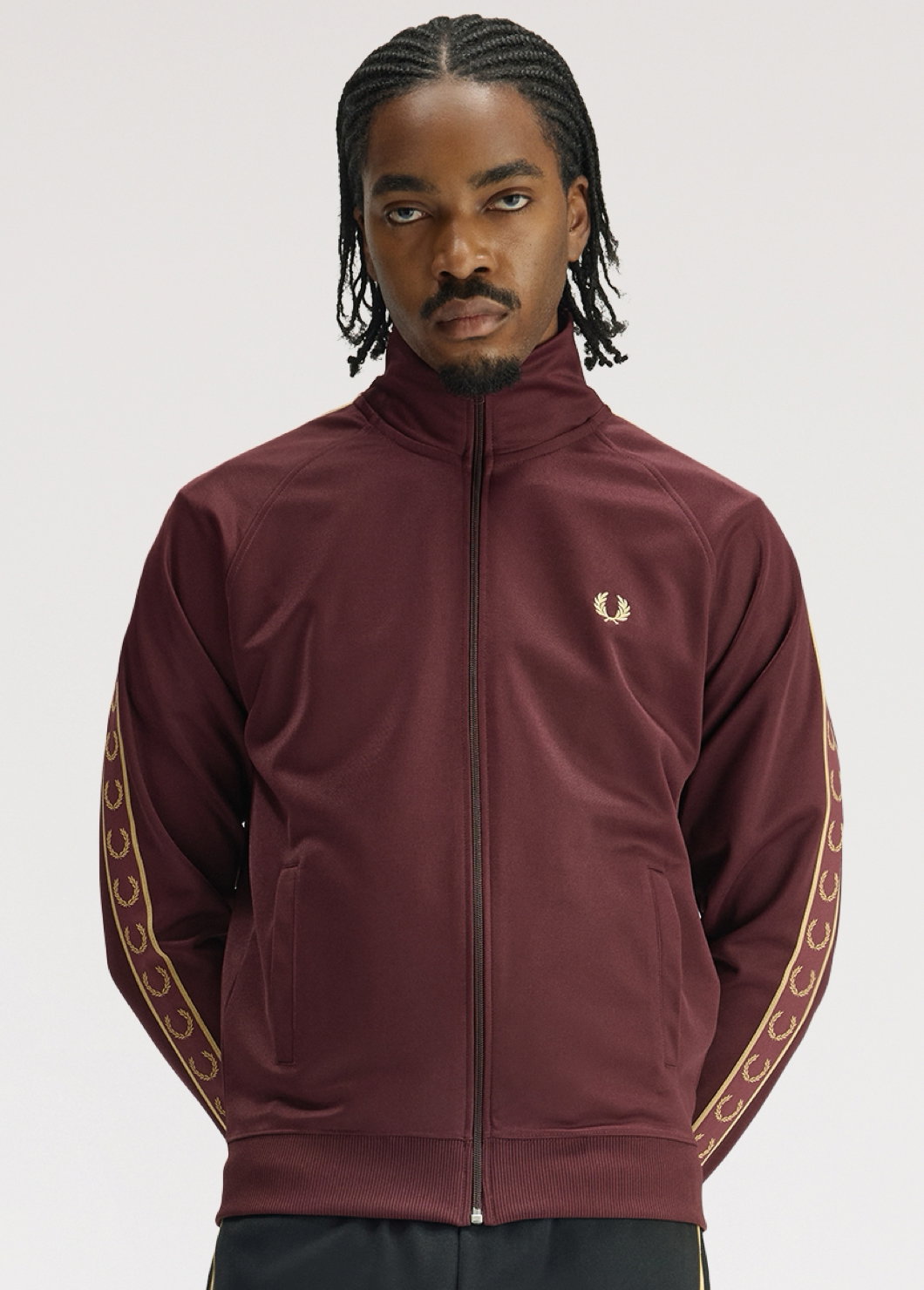 Taped track jacket in Oxblood colour with contrast gold taping