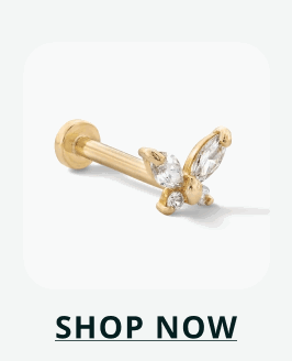 Gold flat-back stud shaped like a delicate butterfly adorned with small stones. Click here to shop now