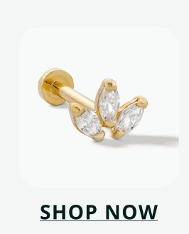 Gold flat-back stud with three marquise-cut stones arranged in a fan-like cluster. Click here to shop now