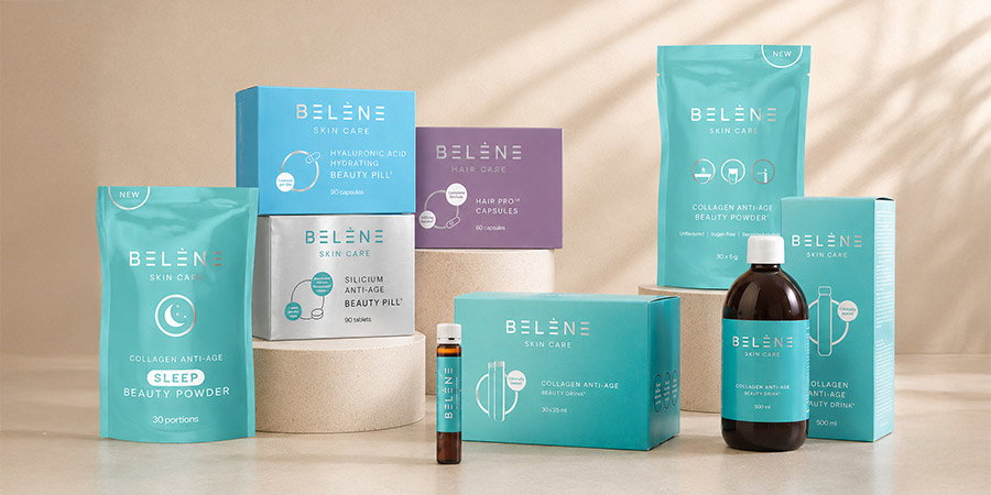 Assorted Belène skin and hair anti-age collagen products: powders, pills, capsules and beauty drink on neutral background
