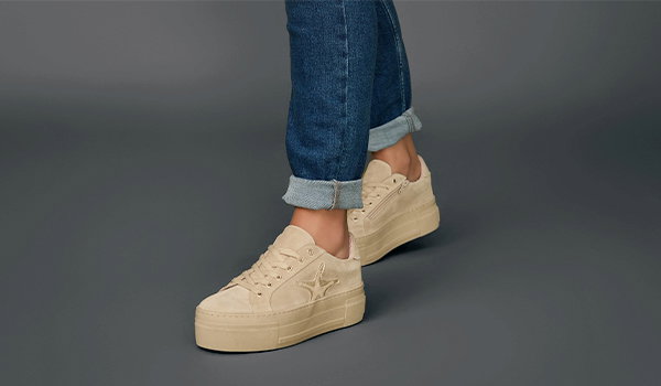 Beige Espadrille Loafers and a handbag