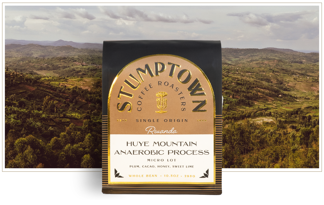 Stumptown Coffee Roasters Huye Mountain Anaerobic Process coffee bag displayed in front of a lush, rolling landscape of Rwanda, with the text “Only 240 Bags” beneath, highlighting the limited release.