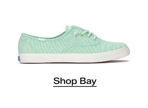 A side view of the Rillax Champ Chalky Canvas Slip-On in bay. Shop Bay.