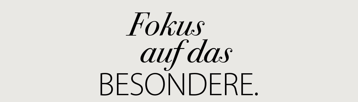 Textgrafik, schwarzer Schriftzug „Fokus auf das Besondere“, Vorderansicht