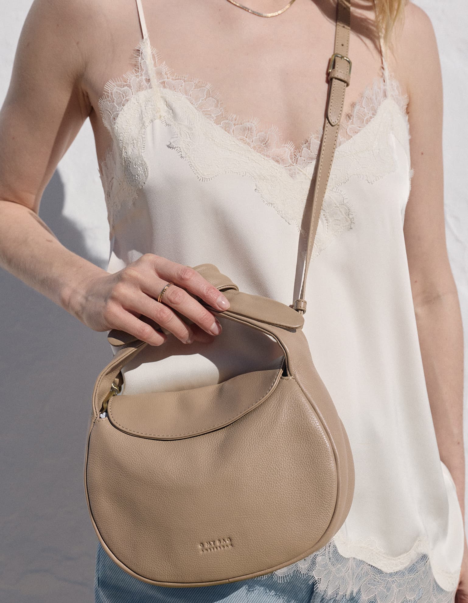 Model wearing the Coco in Dark Sand