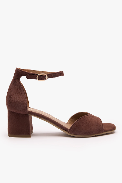 Brown suede block heel sandal with ankle strap on white background.