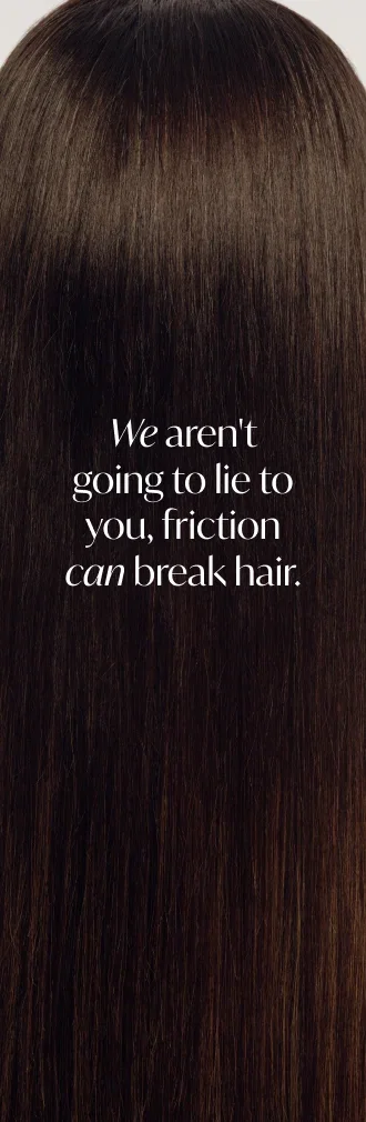 Dark brown hair close up, "We aren't going to lie to you, friction can break hair." overlay
