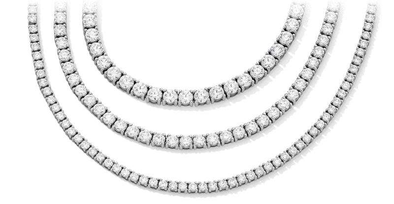 Three different size white gold diamond tennis necklaces.