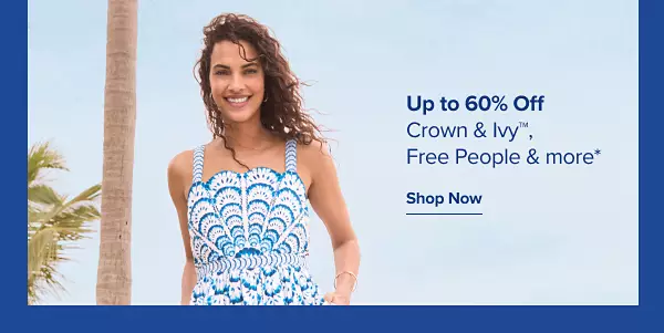 A woman in a white and blue dress. Up to 60% off Crown and Ivy, Free People and more. Shop now.