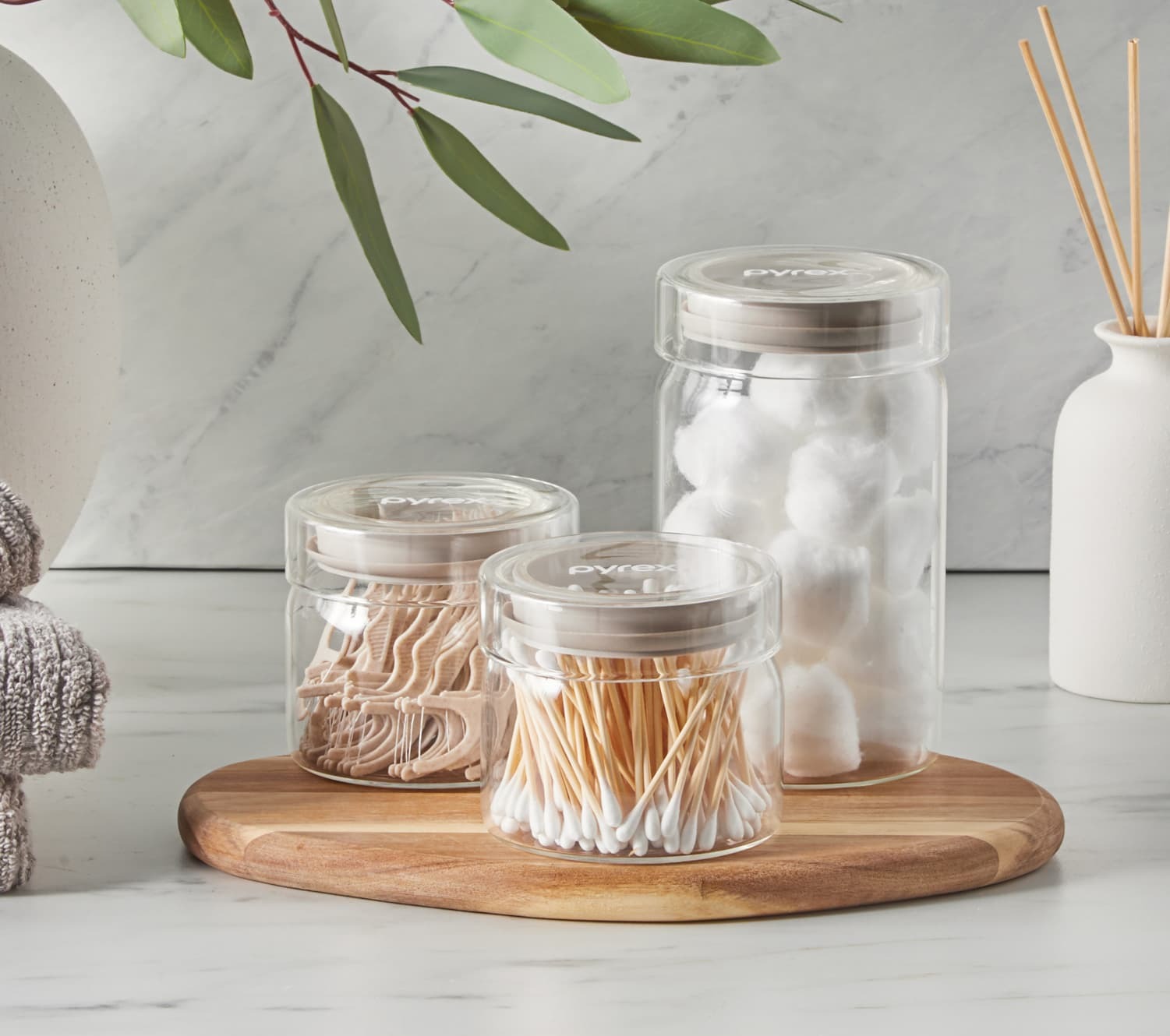 PY Glass canisters on the table desktop 