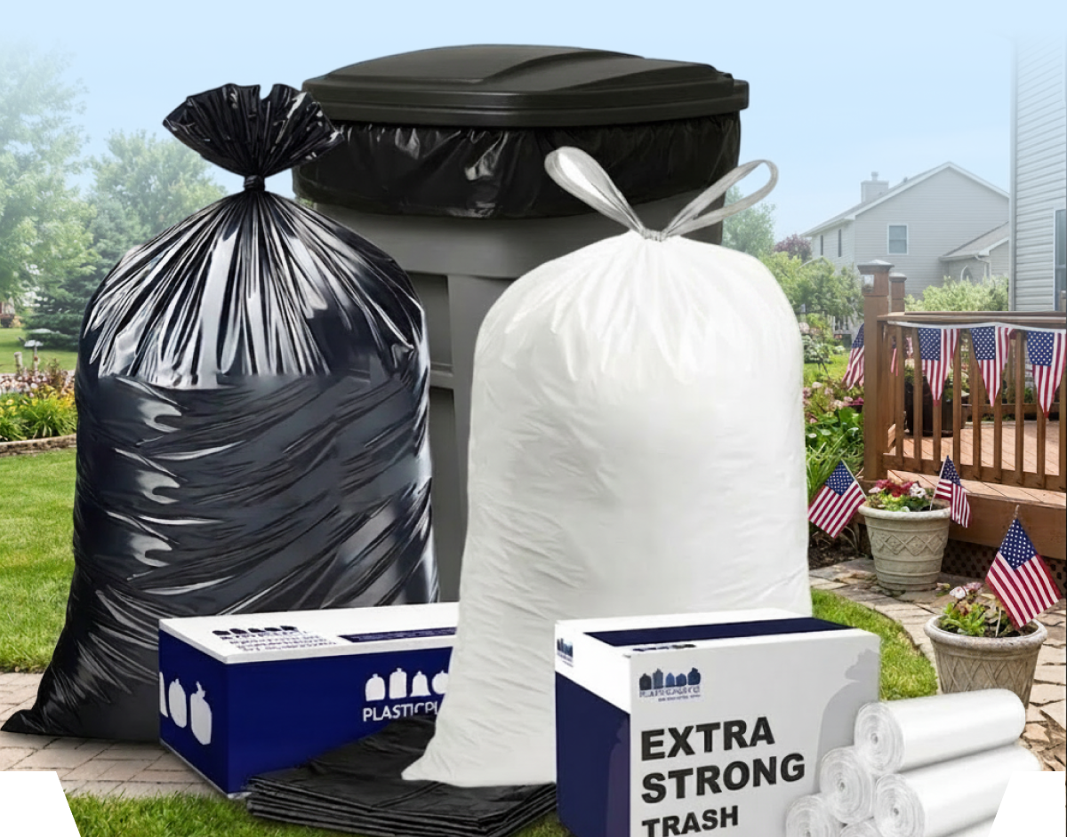Various trash bags and a trash can in a yard with flags.