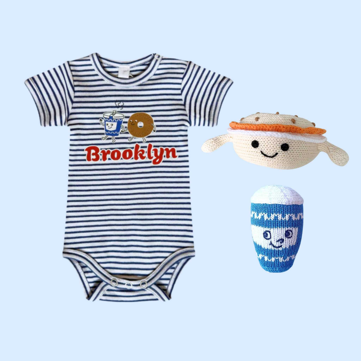 NYC Brunch Baby Gift Set lifestyle image showing brunch-themed baby items