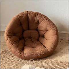 Sillón Cama Nido, Refugio de Diseño Circular y Tradición Futón Japonesa