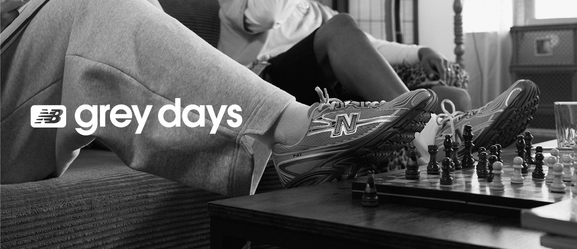 Grey image with a man and a woman in grey new balance clothings and text saying "NB grey days"