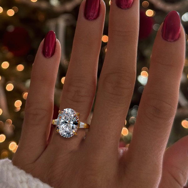 Golden Oval Three Stone Engagement Ring