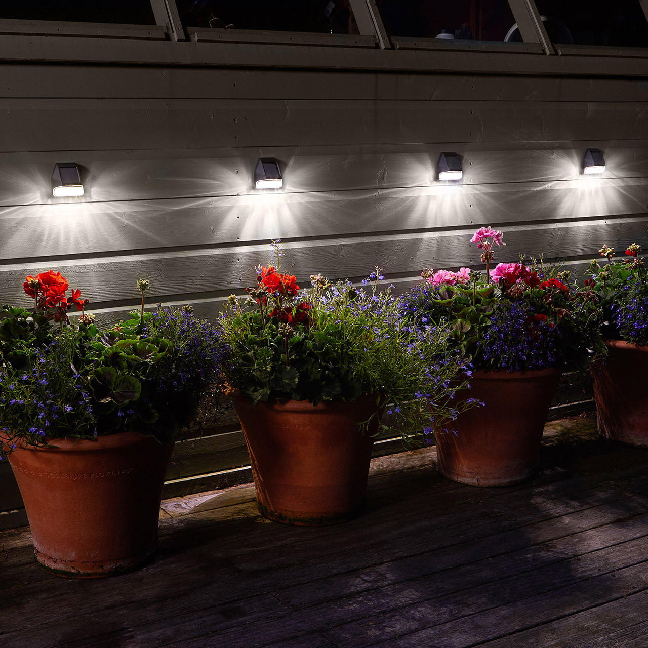 SuperBright LED Solar Wall and Fence Light White Outdoor Garden Lights in Black (4 Pack)