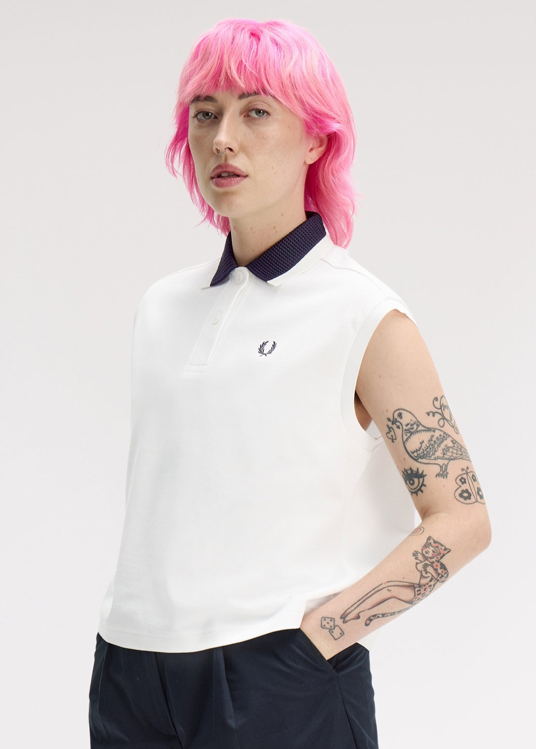 New Releases woman: female model wear sleeveless white polo with black collar