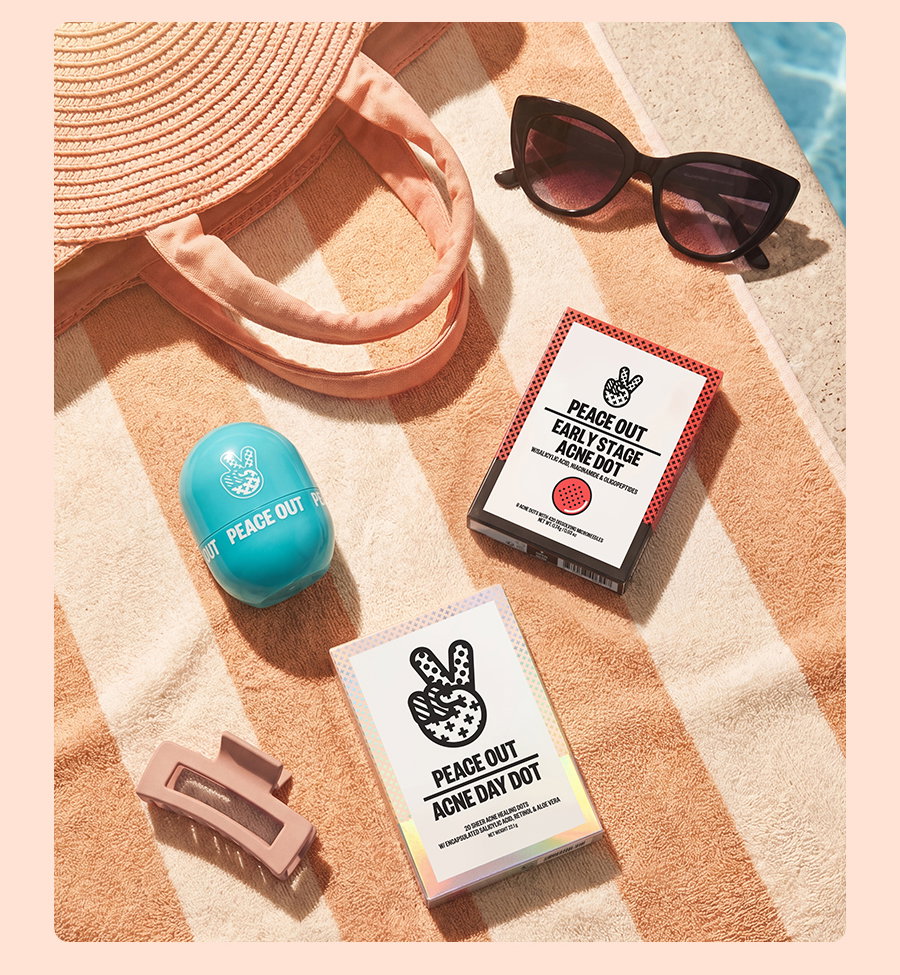 Peace Out Products sit atop a beach towel