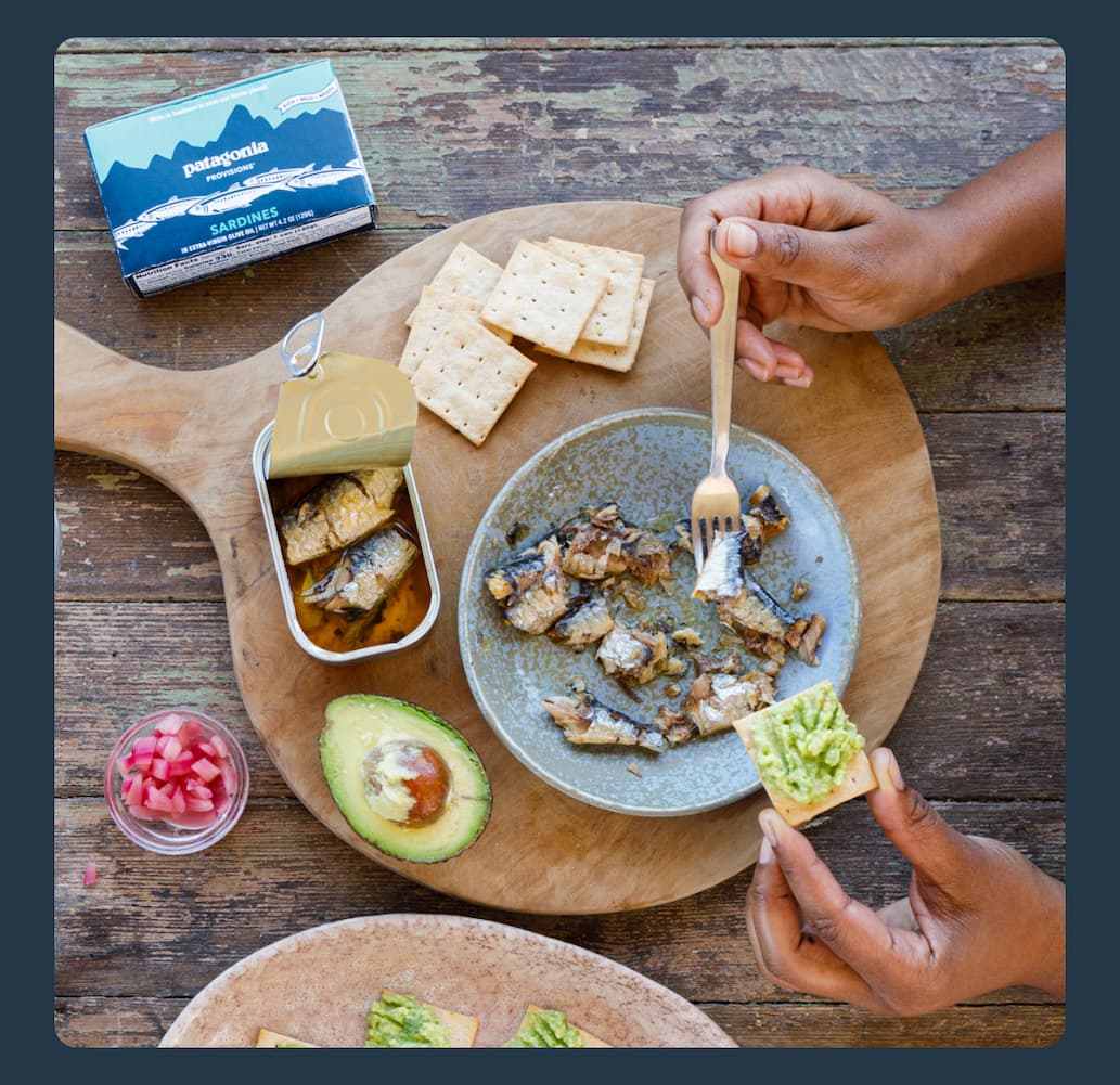 Sardines and avocado on crackers