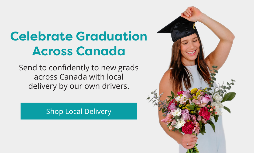 New grad holding a Callia bouquet
