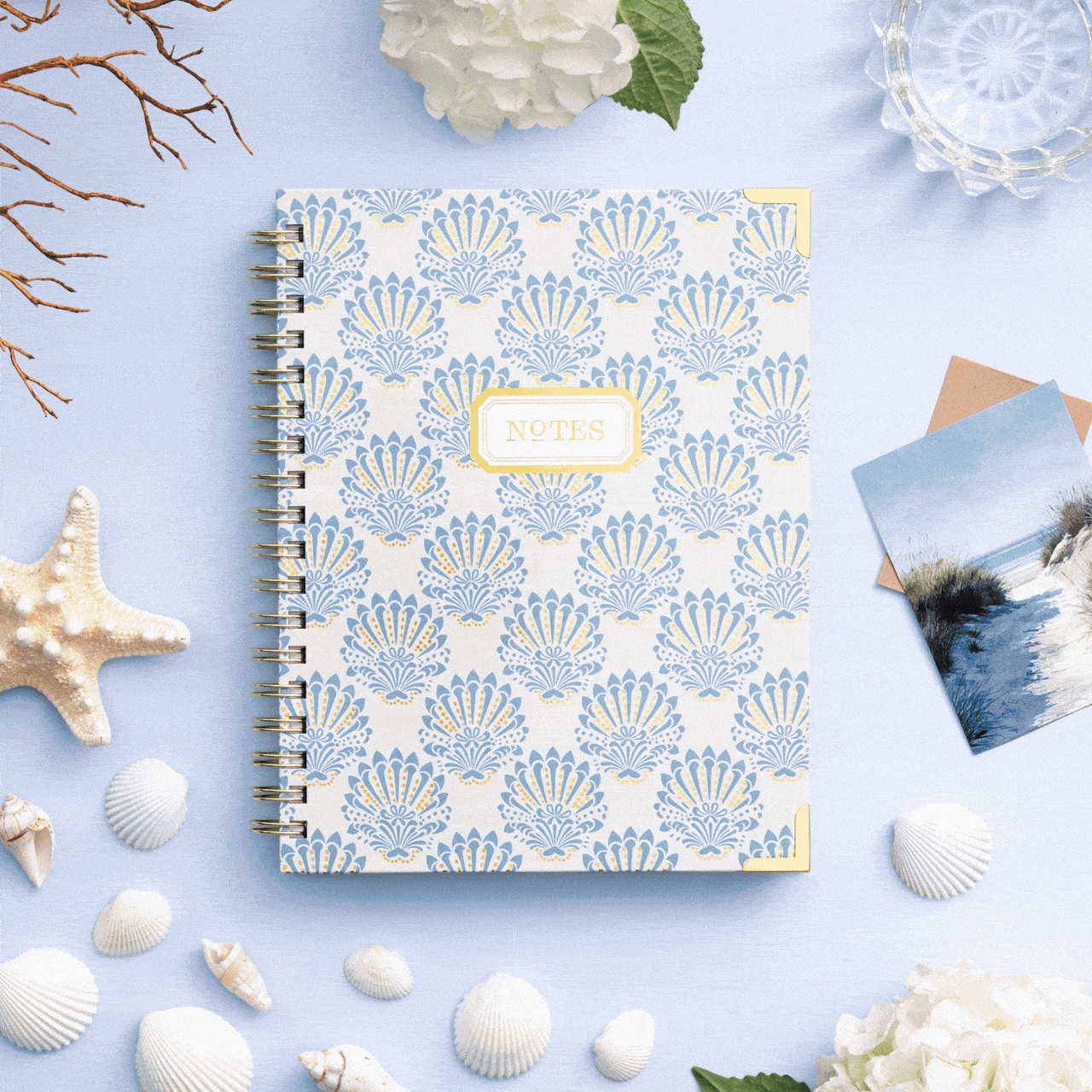 rotating images of notebooks in a variety of colors