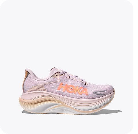 Images of: a person wearing the Elaro Crop Bra, a person wearing the Elaro Bike short, a person mid run on a street, the Skyward X2 road running shoe in Lilac Cream / Tangerine Glow.