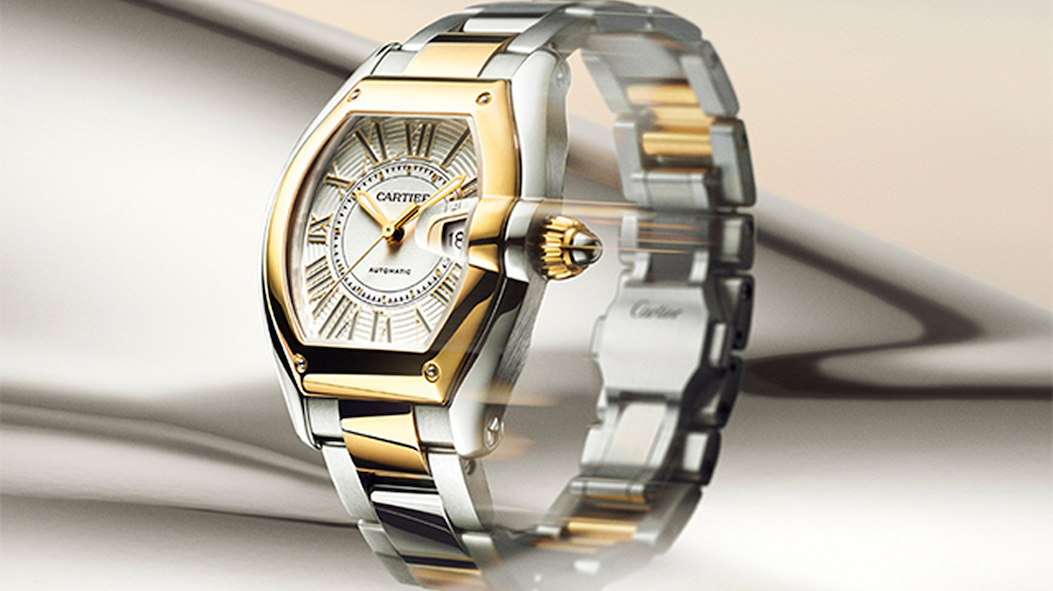 Cartier Roadster in yellow gold and steel tilted to the side