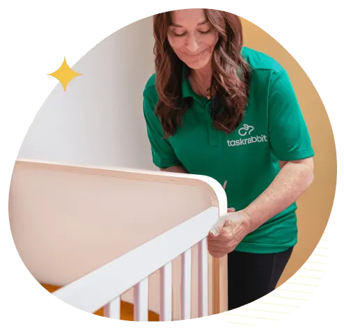 Tasker assembling a crib