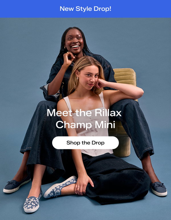 At the top of the email, a bright blue banner with white text says New Style Drop! Two smiling women seated on a blue studio background, both wearing the Rillax Champ Mini Slip-Ons paired with dark-wash denim. The woman in the back is wearing the washed twill version in blue and the woman in the front is wearing the chambray floral embroidery version in light blue. Text on the image says Meet the Rillax Champ Mini. Shop the Drop.