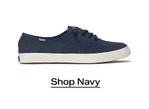 A side view of the Rillax Champ Chalky Canvas Slip-On in navy. Shop Now.