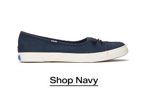 A side view of the Rillax Champ Mini Washed Twill Slip-On in navy. Shop Now.