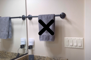 There's a much prettier way to hang your bathroom towels
