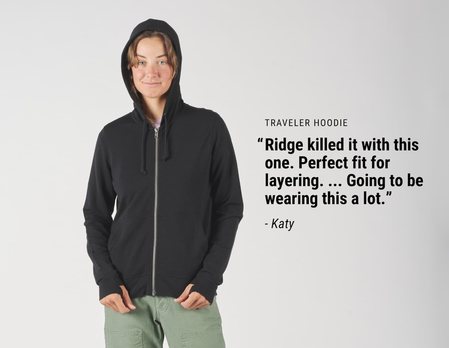 a woman wearing a Traveler Hoodie