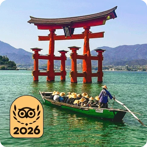 Image Description: A group of people on a boat in the water near a red structure. A gold 2026 Travellers’ Choice Best of the Best badge is on the image.